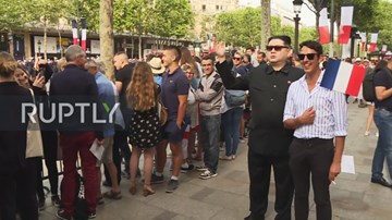 'NLĐ Kim Jong Un' vui vẻ ở Paris nhân ngày Quốc khánh Pháp