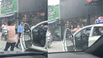 Tài xế taxi rút gậy dọa đánh bảo vệ lớn tuổi vì bị đuổi không cho đỗ xe