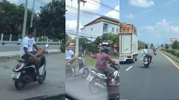 Thanh niên khoanh chân chữ ngũ, chạy xe máy 64km/h bằng một tay