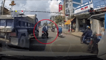 Tài xế xe tải ép thanh niên chạy xe máy khiến nhiều người hoảng sợ