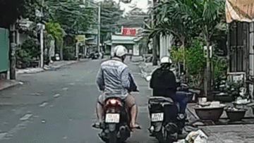 Phản ứng siêu nhanh của cô gái khiến 2 tên trộm tăng ga bỏ chạy