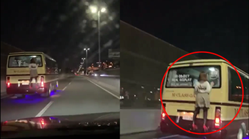 Bất ngờ về cô gái đu bám sau xe buýt đang đi trên đường