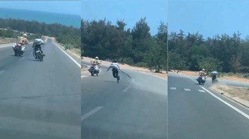 Thanh niên cầm rựa chạy xe máy lạng lách, thách thức CSGT