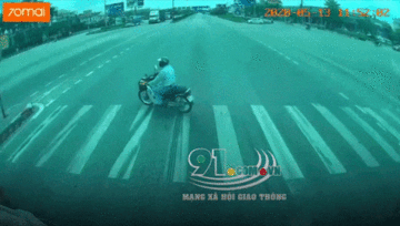 Sang đường thiếu quan sát, người đàn ông suýt chết dưới bánh xe container
