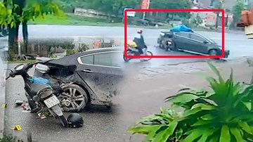 Xe máy lao thục mạng, nam thanh niên văng lên nóc ô tô nằm im