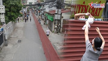 Tháo 'bức tường' tôn cao 2m, dài 200m cắt đôi ngõ Hà Nội để phòng dịch