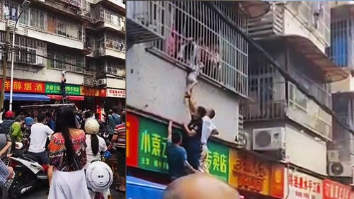 Hàng trăm người giải cứu bé trai lơ lửng ngoài cửa sổ khi ở nhà một mình